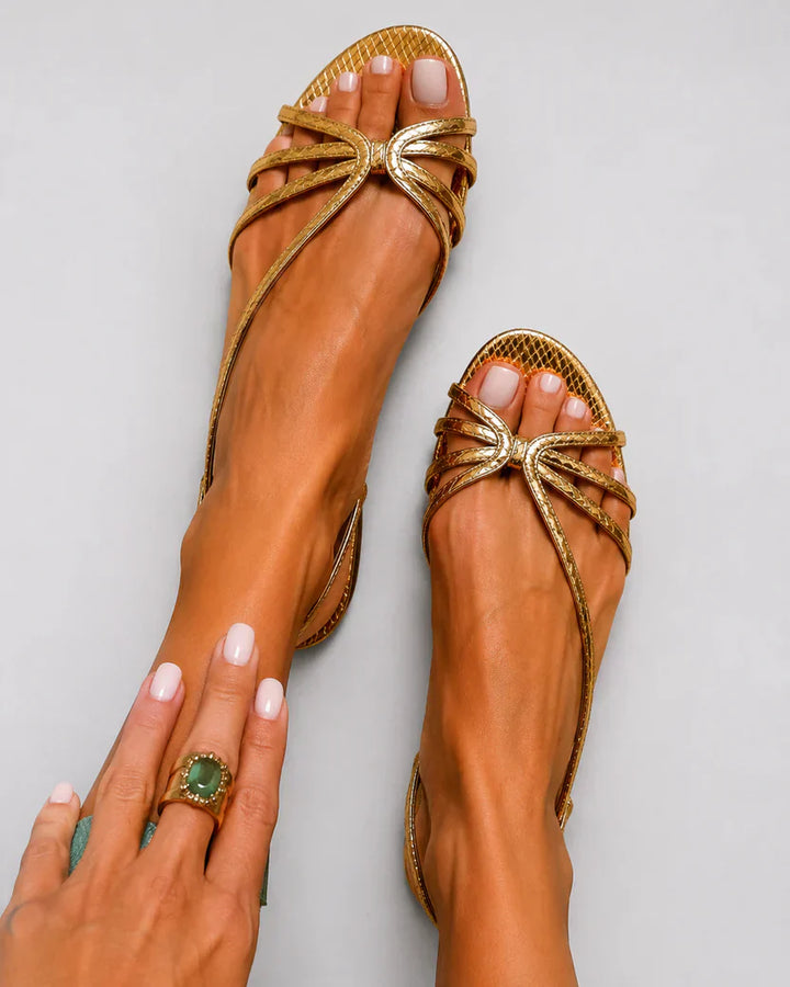 Metallic sandals with straps